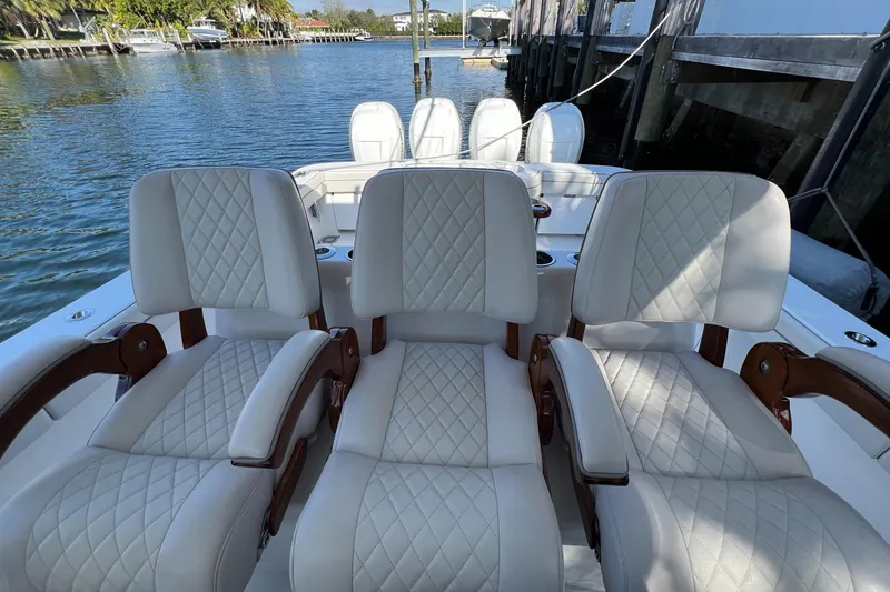 Slide: The Image of Luxurious seating on 2021 Valhalla Boatworks V-41, featuring elegant quilted upholstery. - 12