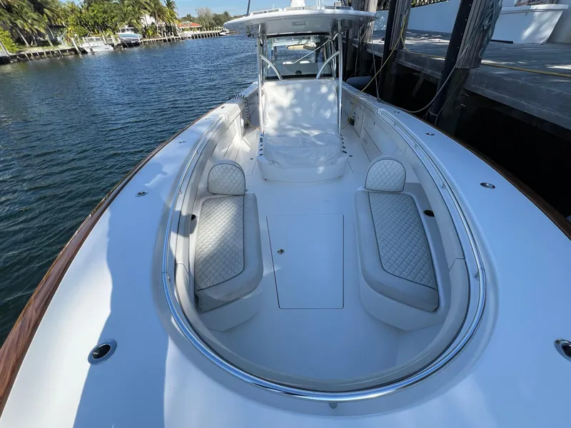 Slide: The Image of 2021 Valhalla Boatworks V-41, sleek white design, spacious seating, docked by the water. - 15