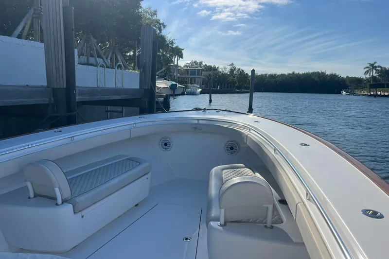 Slide: The Image of 2021 Valhalla Boatworks V-41 docked by a serene waterfront. - 16
