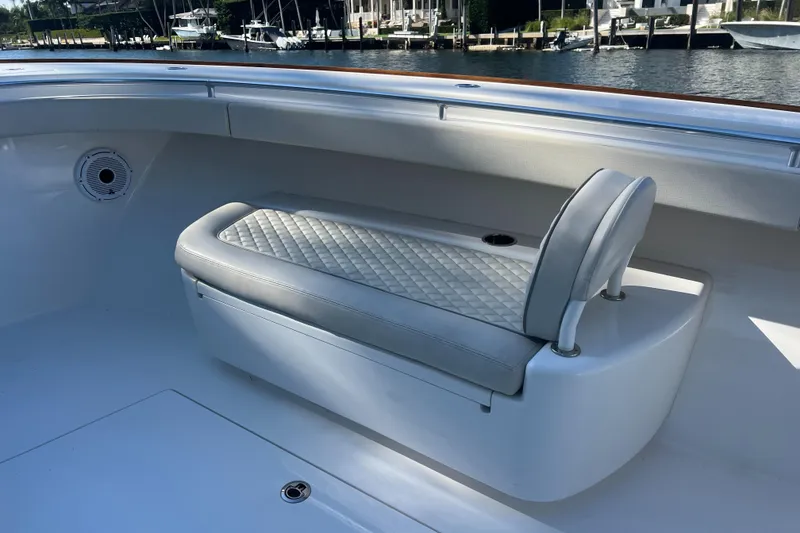 Slide: The Image of 2021 Valhalla Boatworks V-41 interior with cushioned seating and elegant design. - 19