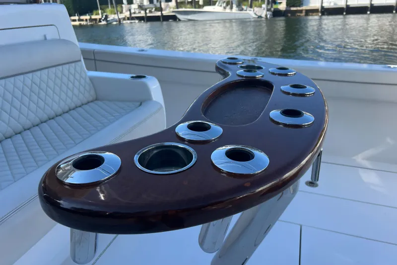 Slide: The Image of Valhalla Boatworks V-41 2021, luxury seating and rod holders on deck. - 2