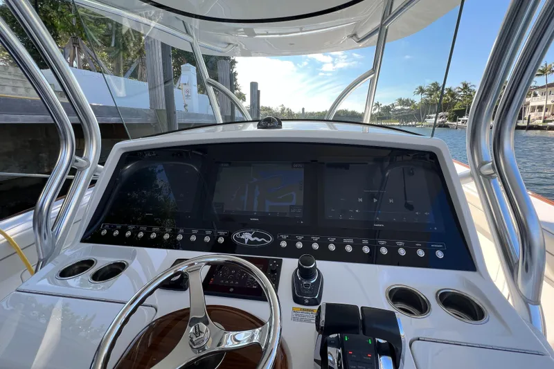 Slide: The Image of 2021 Valhalla Boatworks V-41 helm with advanced navigation displays and controls. - 6