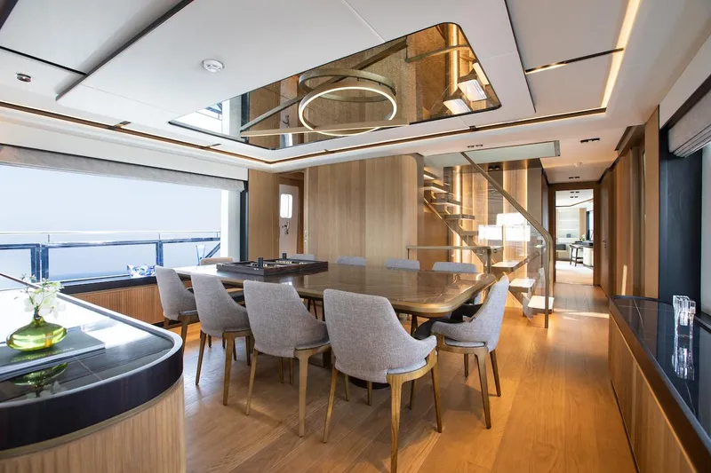 Slide: The Image of Luxurious interior of 2026 Majesty 111 yacht with elegant dining area and modern design. - 22