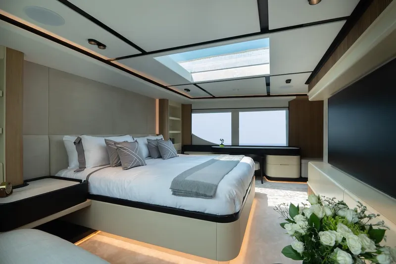 Slide: The Image of Luxurious bedroom interior on 2026 Majesty 111 yacht with skylight and modern decor. - 29