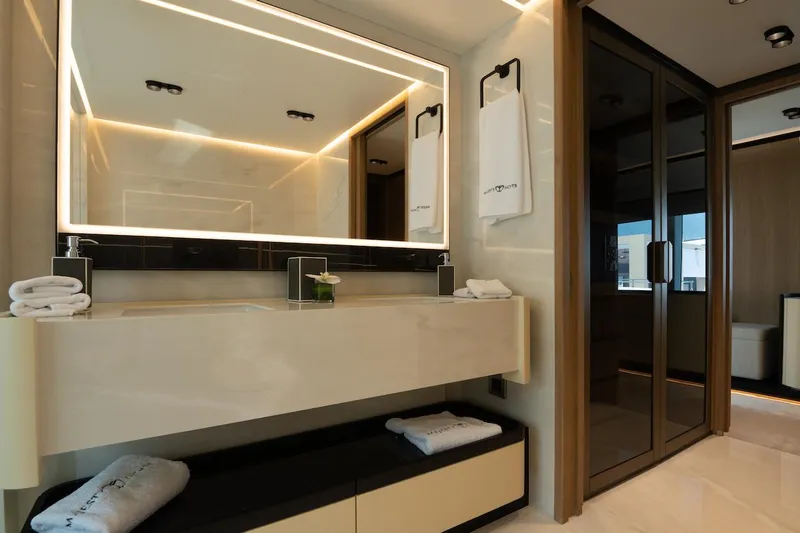 Slide: The Image of Luxurious bathroom interior on Majesty 111 yacht, featuring modern vanity and elegant lighting, 2026 model. - 31