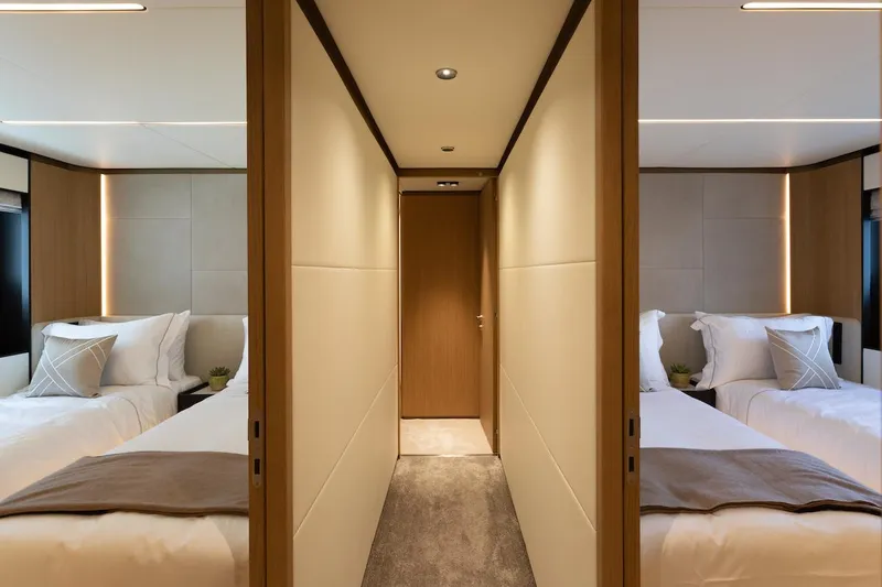 Slide: The Image of Luxurious twin bedroom interior on 2026 Majesty 111 yacht. - 34