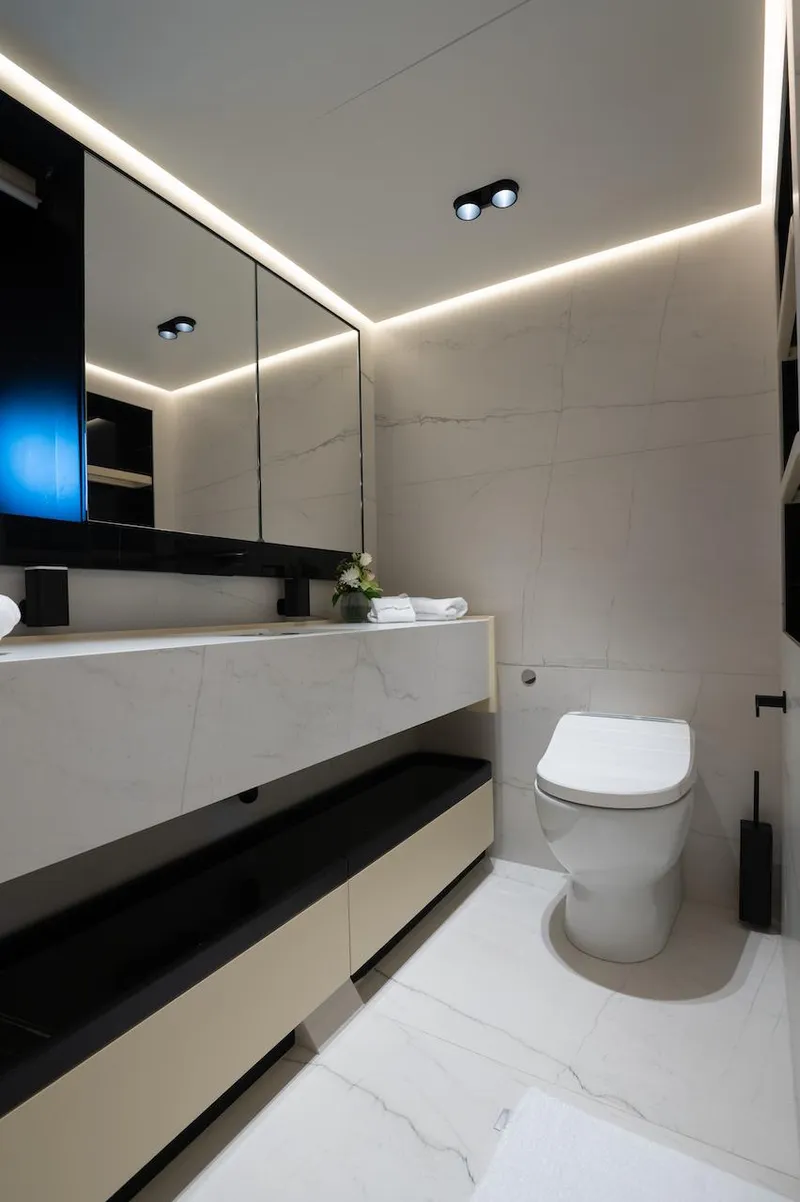 Slide: The Image of Modern bathroom in 2026 Majesty 111 yacht, featuring sleek design and ambient lighting. - 35