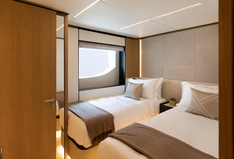 Slide: The Image of Luxurious twin bedroom in 2026 Majesty 111 yacht, featuring modern design and cozy ambiance. - 36