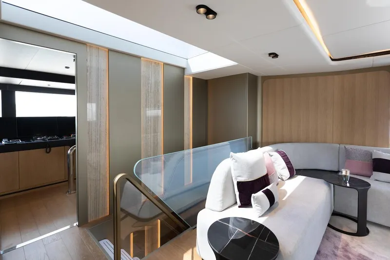 Slide: The Image of Luxurious interior of 2026 Majesty 111 yacht with modern seating and elegant design. - 37