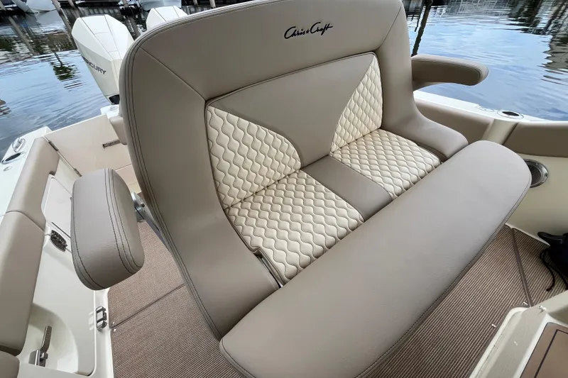 Slide: The Image of Luxurious seating on 2025 Chris-Craft Catalina 28 boat, featuring elegant quilted upholstery. - 16