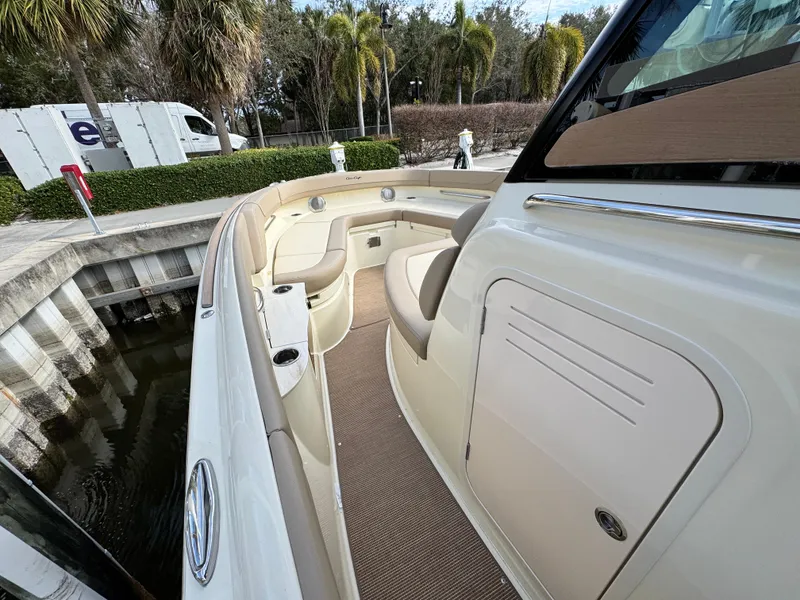 Slide: The Image of 2025 Chris-Craft Catalina 28 boat with elegant seating and sleek design. - 21