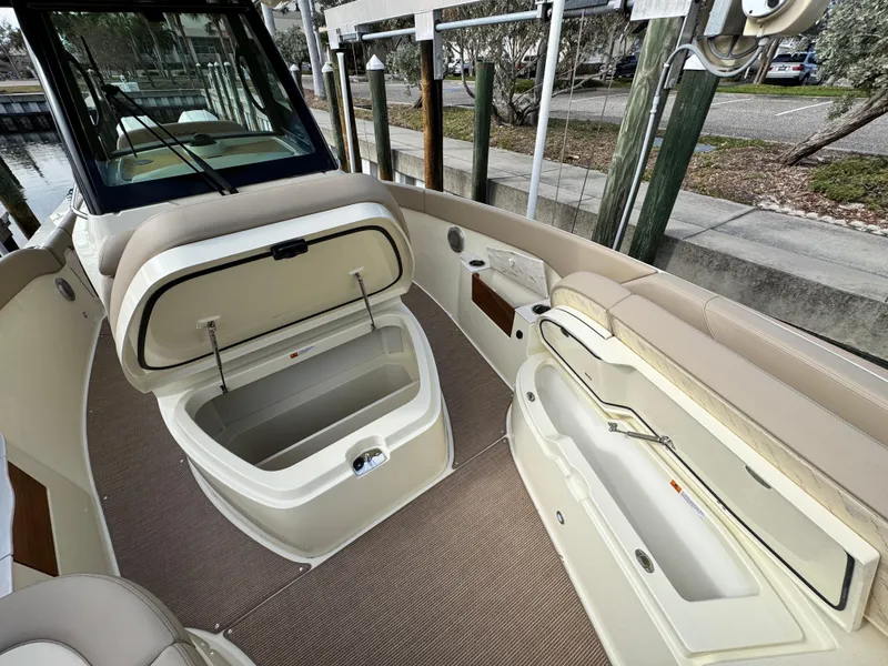 Slide: The Image of 2025 Chris-Craft Catalina 28 boat interior with open storage compartments. - 26