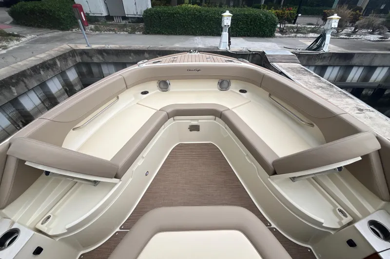 Slide: The Image of 2025 Chris-Craft Catalina 28 boat interior with beige seating and sleek design. - 33