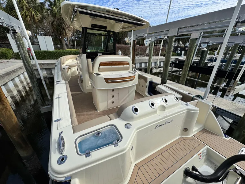Slide: The Image of 2025 Chris-Craft Catalina 28 boat docked, featuring spacious deck and modern amenities. - 6