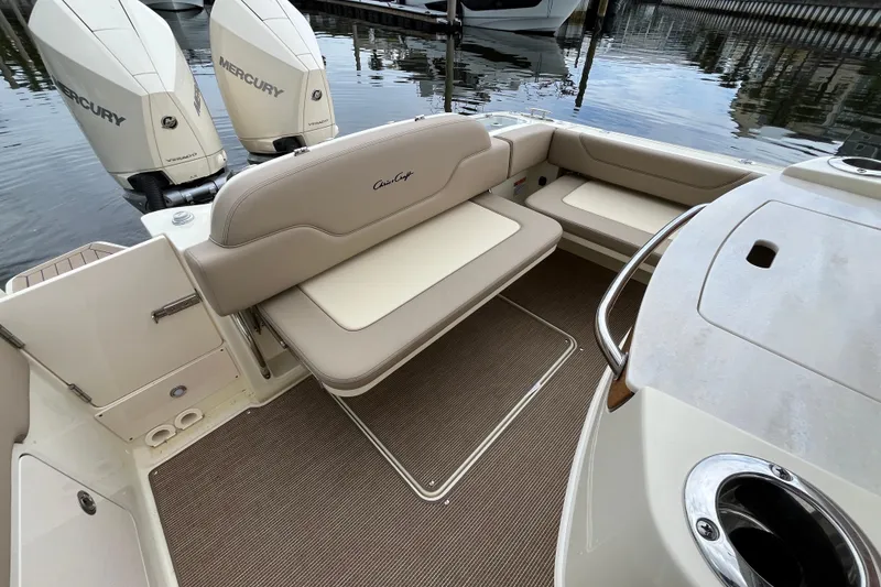 Slide: The Image of 2025 Chris-Craft Catalina 28 boat interior with seating and Mercury engines. - 9