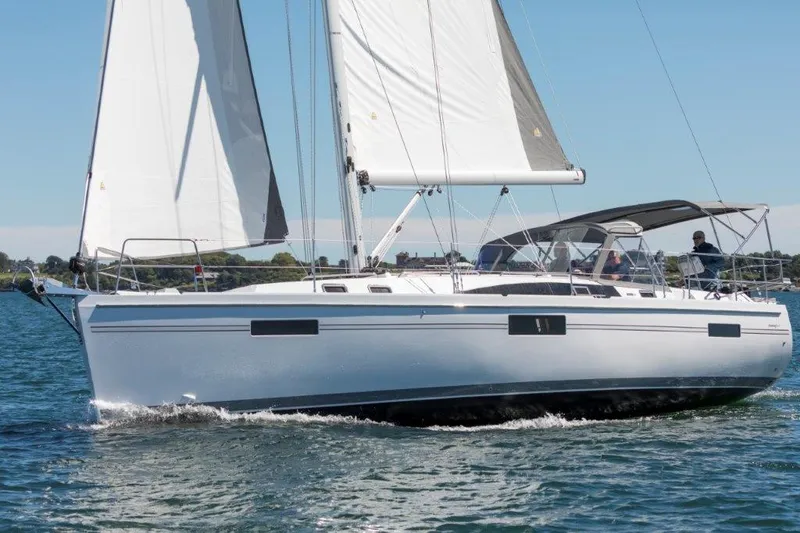 Slide: The Image of Sailing yacht Catalina 426, 2025 model, cruising on open water with full sails. - 8