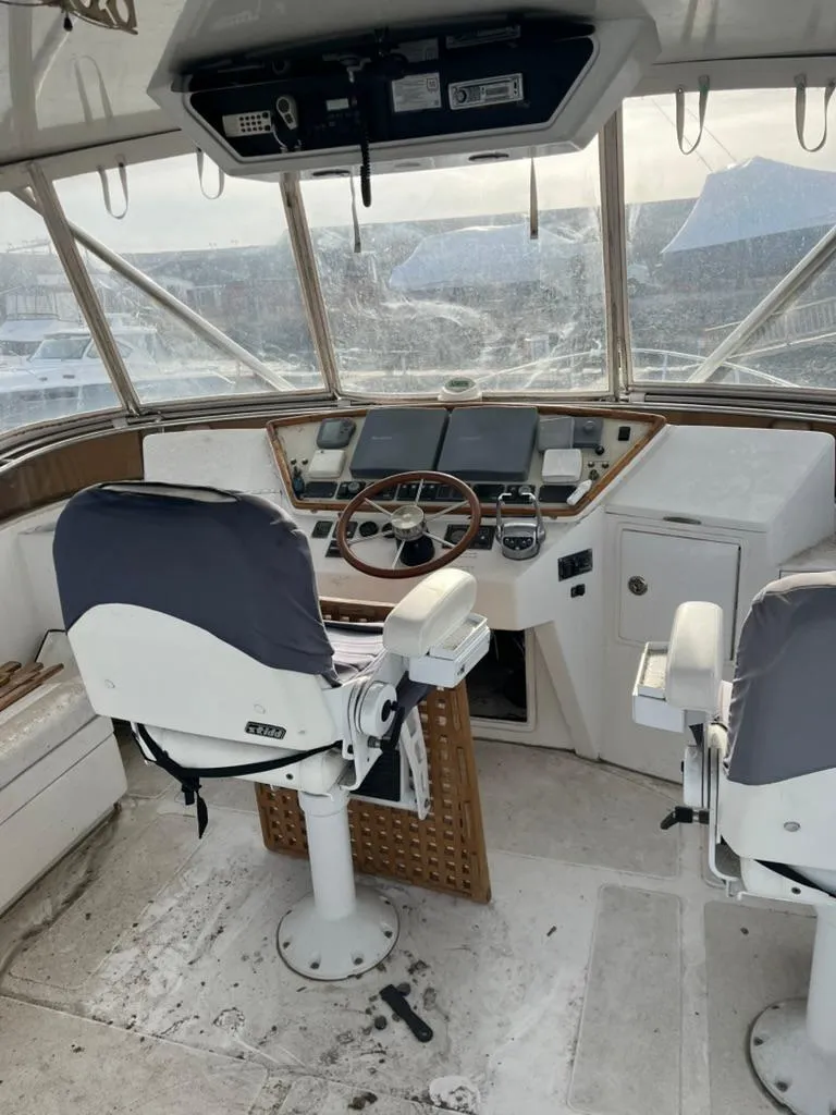 Slide: The Image of 2005 Albin 45 Command Bridge helm with dual seats and navigation equipment. - 10