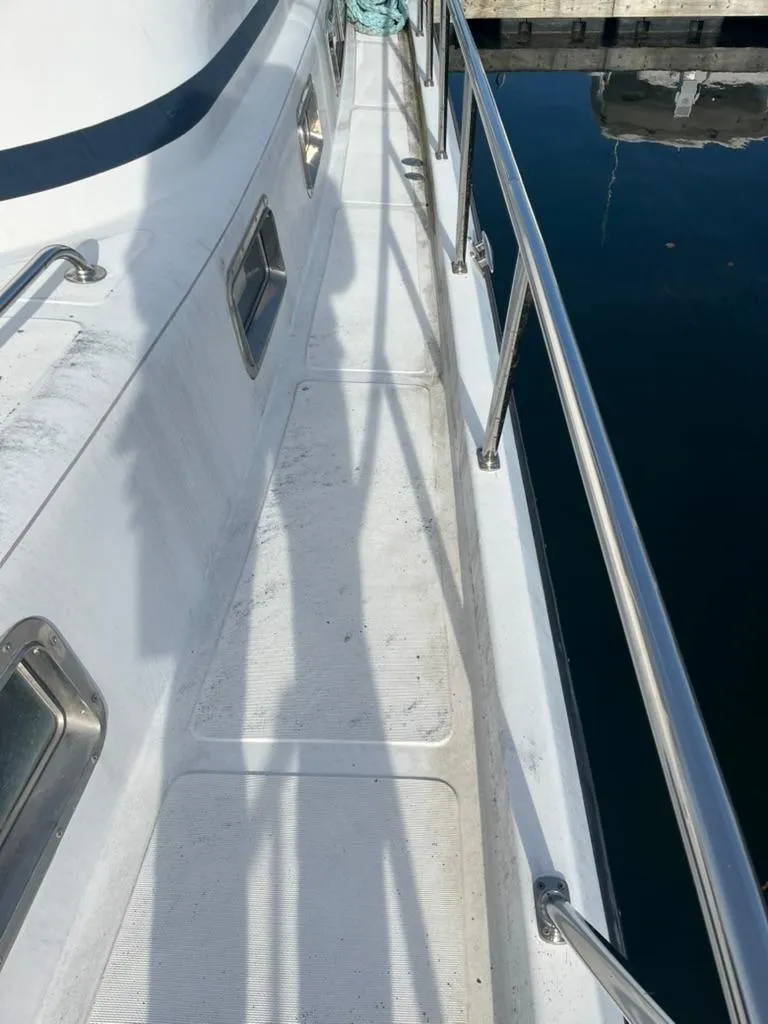 Slide: The Image of 2005 Albin 45 Command Bridge yacht deck with stainless steel railings. - 13
