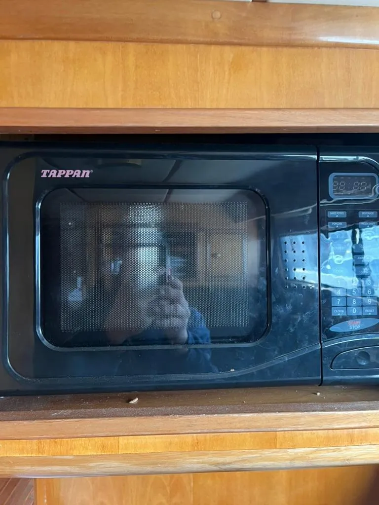 Slide: The Image of Tappan microwave in 2005 Albin 45 Command Bridge kitchen area. - 19