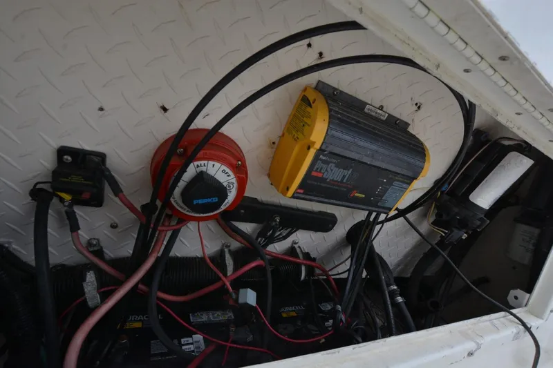 Slide: The Image of 1999 Hydra-Sports 2450 CCH boat electrical system with battery charger and wiring. - 19
