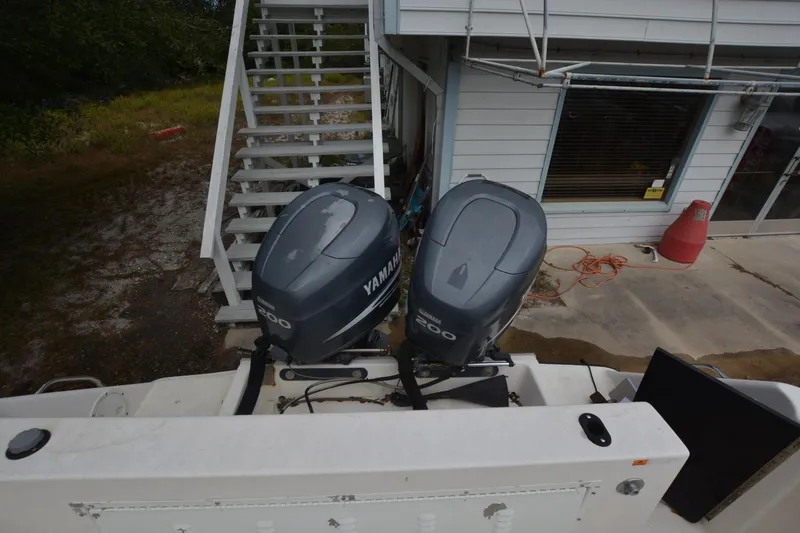 Slide: The Image of 1999 Hydra-Sports 2450 CCH with twin Yamaha outboard motors. - 5