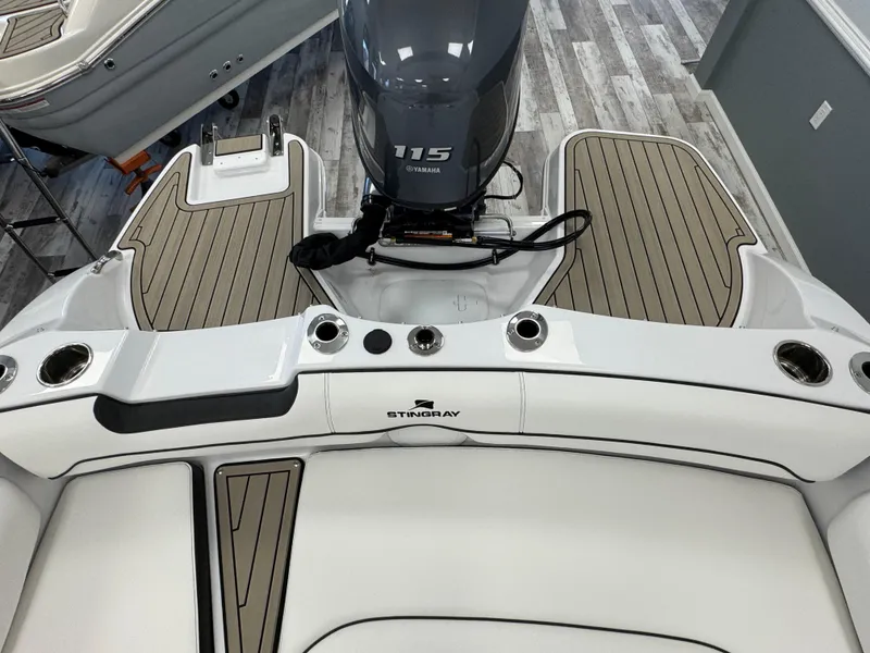 Slide: The Image of 2025 Stingray 191 DC boat with Yamaha 115 engine, featuring sleek deck design. - 17