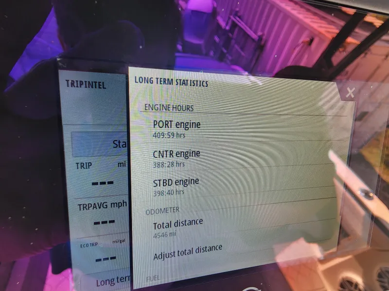 Slide: The Image of Display screen showing engine hours and statistics for 2023 Nor-Tech 340 Sport Center Console. - 20