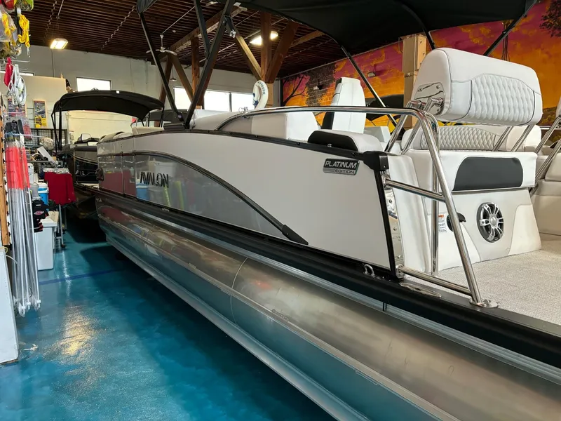 Slide: The Image of 2025 Avalon Catalina Quad Lounger Shift pontoon boat in showroom. - 12