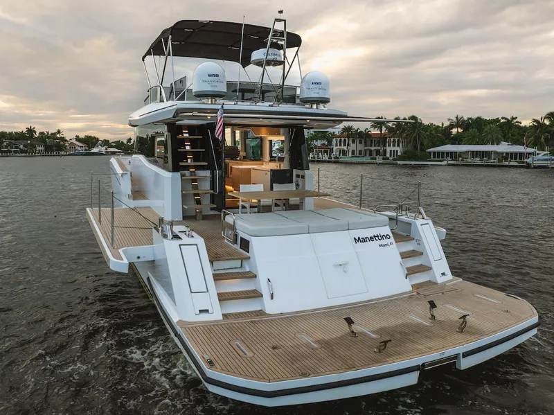 Slide: The Image of 2022 Pardo Yachts E60 luxury yacht on water, rear view, elegant design. - 10