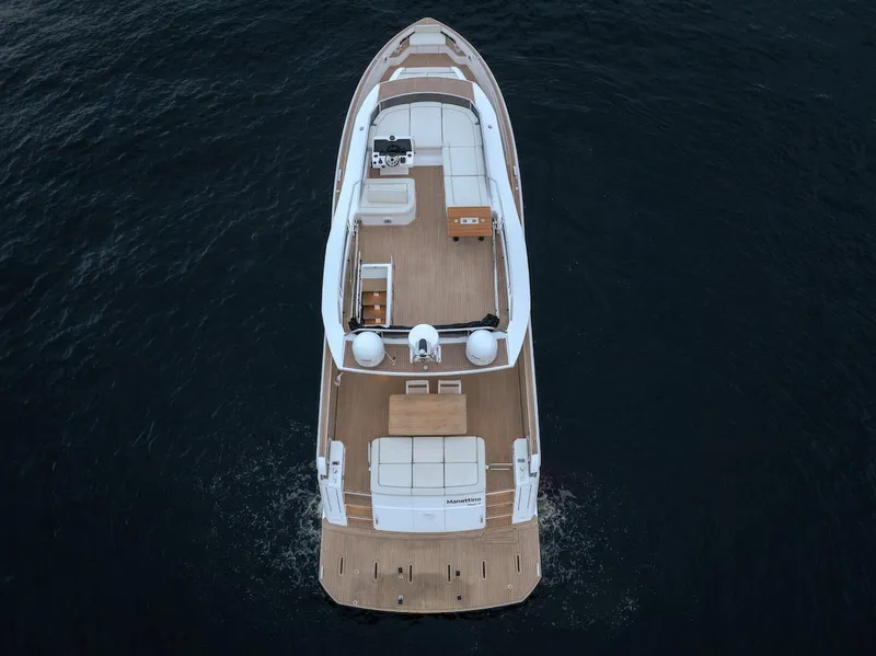 Slide: The Image of 2022 Pardo Yachts E60 luxury yacht on open water, aerial view. - 14