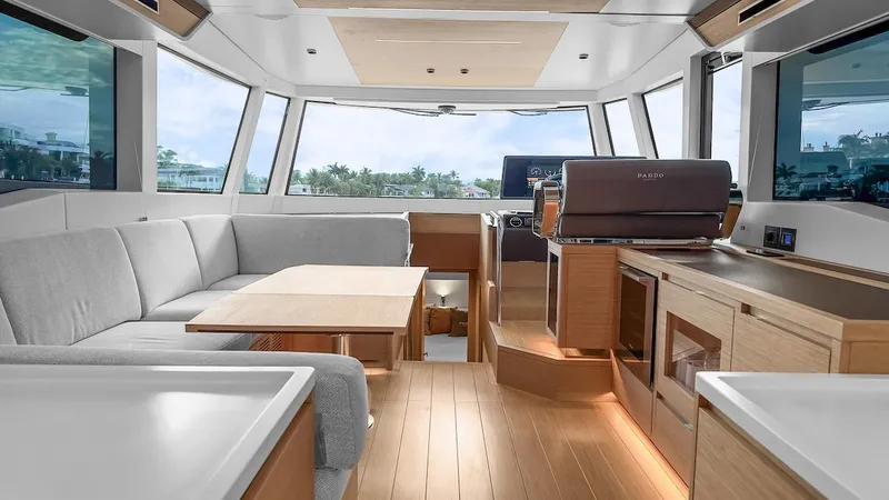 Slide: The Image of Luxurious interior of 2022 Pardo Yachts E60 with modern furnishings and panoramic windows. - 21
