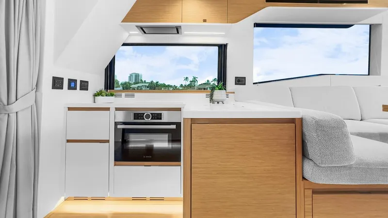 Slide: The Image of Modern kitchen interior of 2022 Pardo Yachts E60 with sleek cabinetry and large windows. - 28