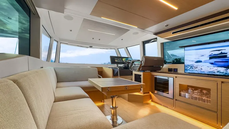 Slide: The Image of Luxurious interior of 2022 Pardo Yachts E60 with modern seating and navigation area. - 29