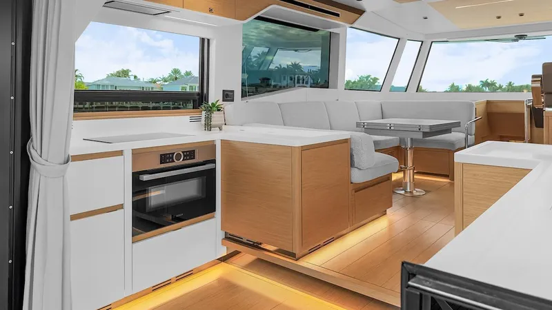 Slide: The Image of Luxurious interior of 2022 Pardo Yachts E60 with modern kitchen and seating area. - 30