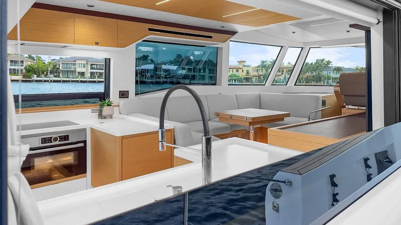 Slide: The Image of Luxurious interior of 2022 Pardo Yachts E60 with modern kitchen and seating area. - 32