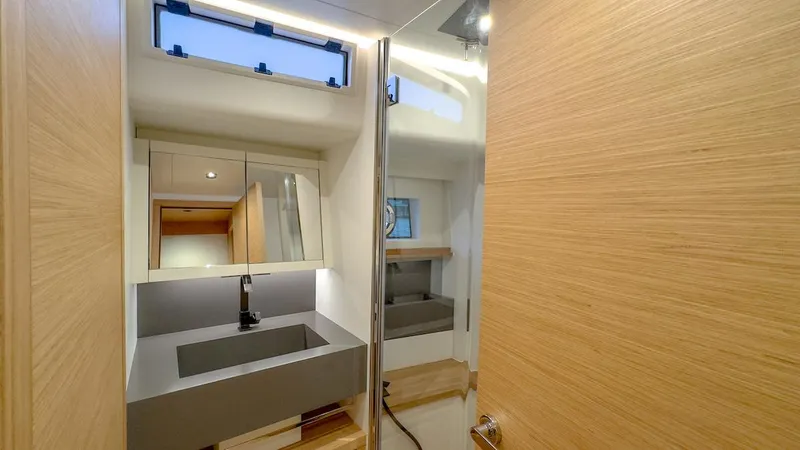Slide: The Image of Modern bathroom interior of 2022 Pardo Yachts E60 with sleek design and natural lighting. - 36