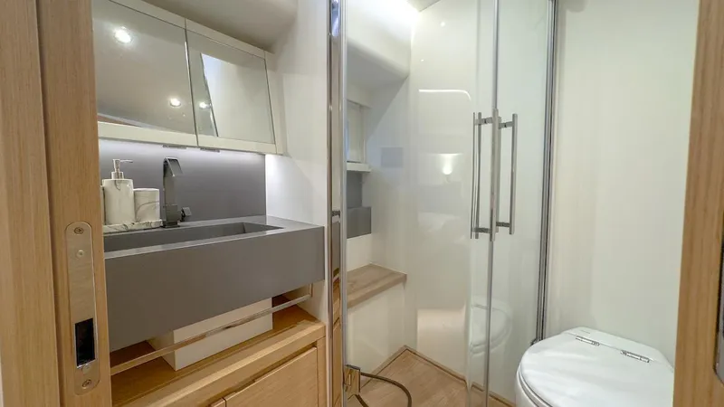 Slide: The Image of Luxurious bathroom in 2022 Pardo Yachts E60 with modern fixtures and glass shower. - 37