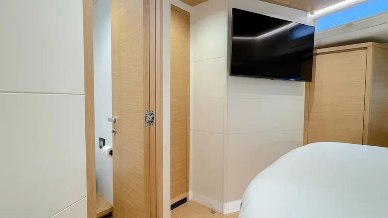 Slide: The Image of Interior of 2022 Pardo Yachts E60 with modern bedroom and bathroom. - 41