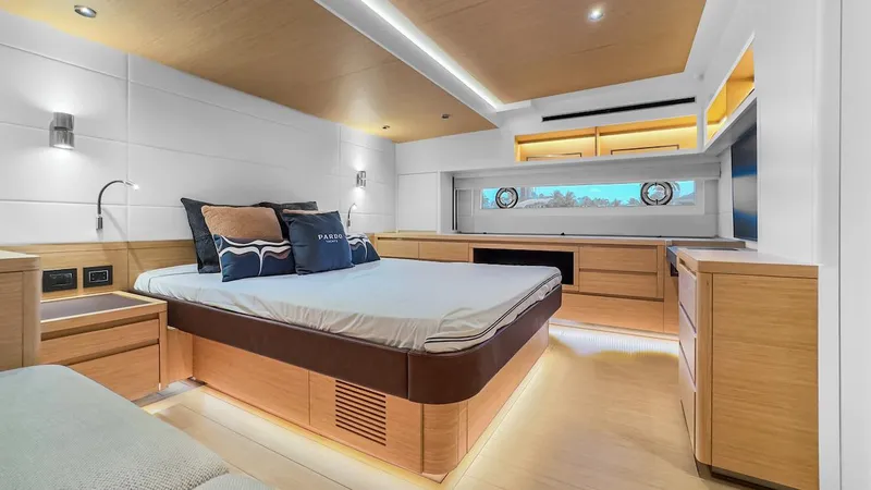 Slide: The Image of Luxurious 2022 Pardo Yachts E60 bedroom with modern design and elegant wood finishes. - 43