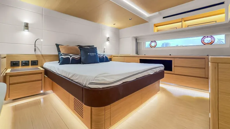 Slide: The Image of Luxurious 2022 Pardo Yachts E60 bedroom with modern design and ambient lighting. - 44