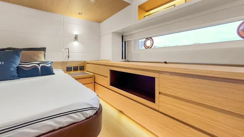 Slide: The Image of Luxurious interior of 2022 Pardo Yachts E60, featuring modern wood finishes and elegant design. - 45