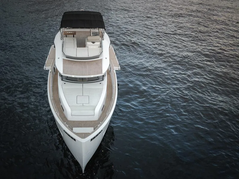 Slide: The Image of Aerial view of 2022 Pardo Yachts E60 luxury yacht on calm water. - 7