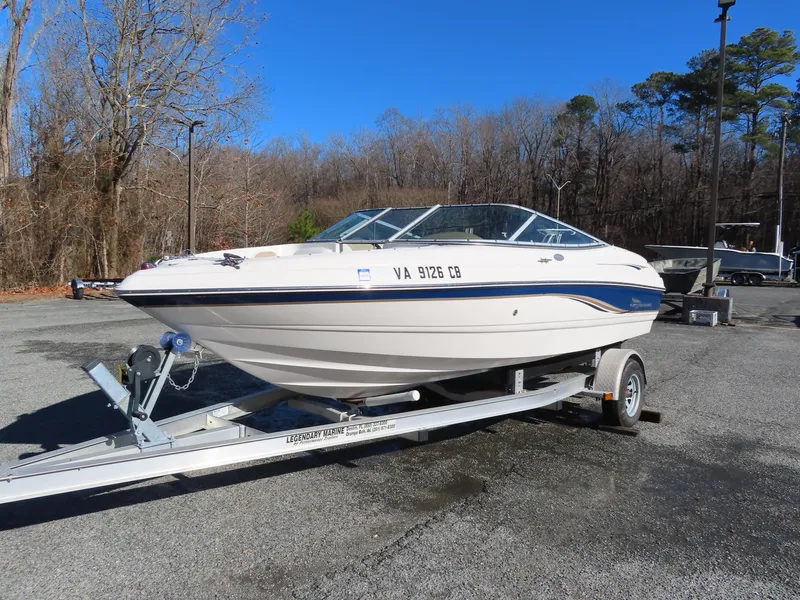 Slide: The Image of 2004 Chaparral 190 SSi boat on trailer, parked outdoors. - 0