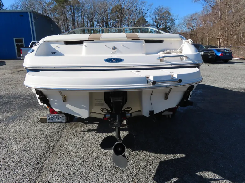 Slide: The Image of 2004 Chaparral 190 SSi boat, rear view, parked outdoors. - 19