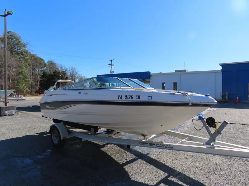 Slide: The Image of 2004 Chaparral 190 SSi boat on trailer in sunny outdoor setting. - 3