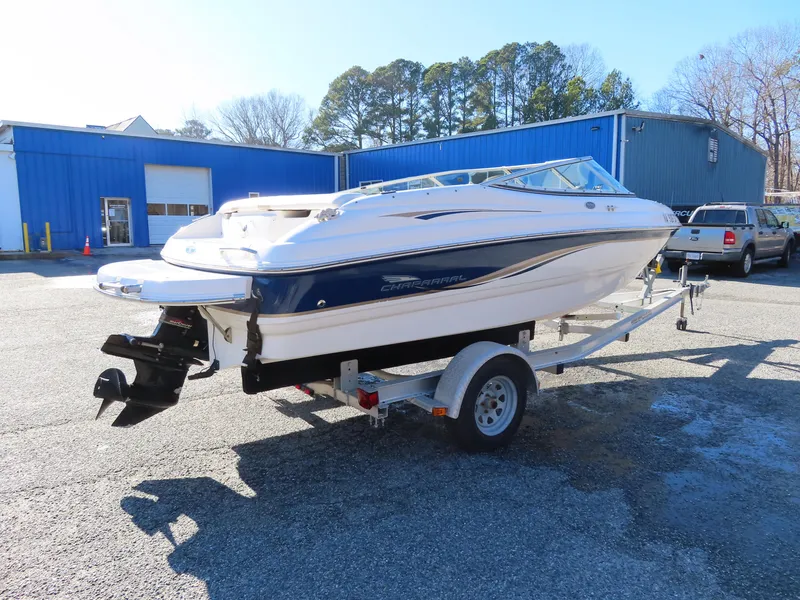 Slide: The Image of 2004 Chaparral 190 SSi boat on trailer in parking lot. - 4
