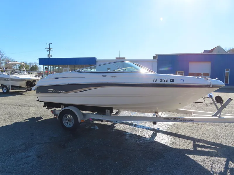 Slide: The Image of 2004 Chaparral 190 SSi boat on trailer in parking lot. - 5