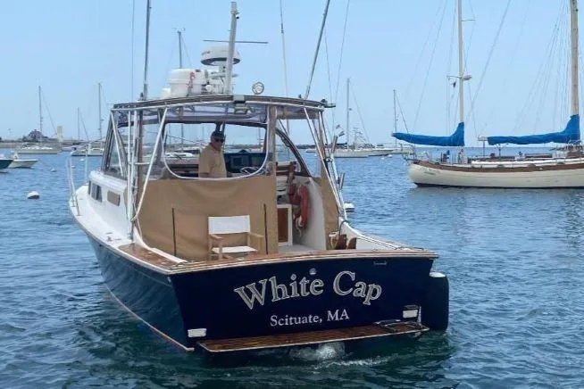 Slide: The Image of Fortier 33 HT Express boat named "White Cap" in Scituate, MA harbor, 1997 model. - 4