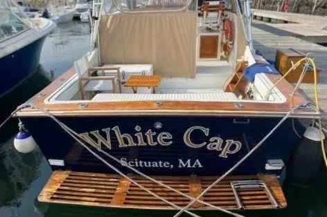 Slide: The Image of 1997 Fortier 33 HT Express boat named "White Cap" docked in Scituate, MA. - 7