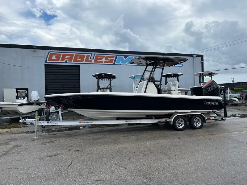 The Image of 2024 ShearWater 260 Carolina Flare boat on trailer at dealership. - 0